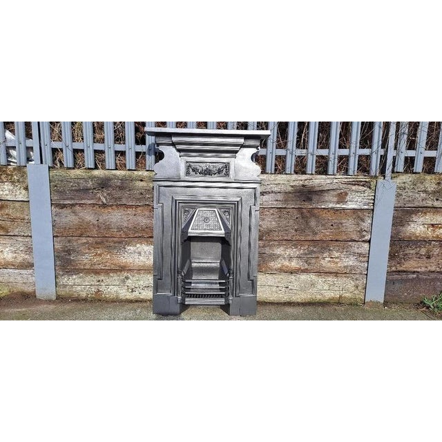 A superb and substantial original Victorian cast iron combination fireplace, dating precisely to 1891 and reclaimed from a...