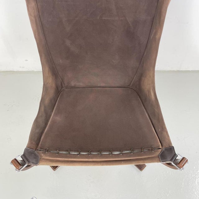 Animal Skin Set of Brown High Backed Falcon Chair with Ottoman by Sigurd Resell For Sale - Image 7 of 10