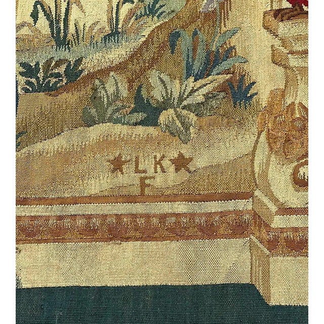A beautifully woven 19th-century verdure wool tapestry, signed L.K.F., attributed to Lorentz Kleiser, celebrated for his...