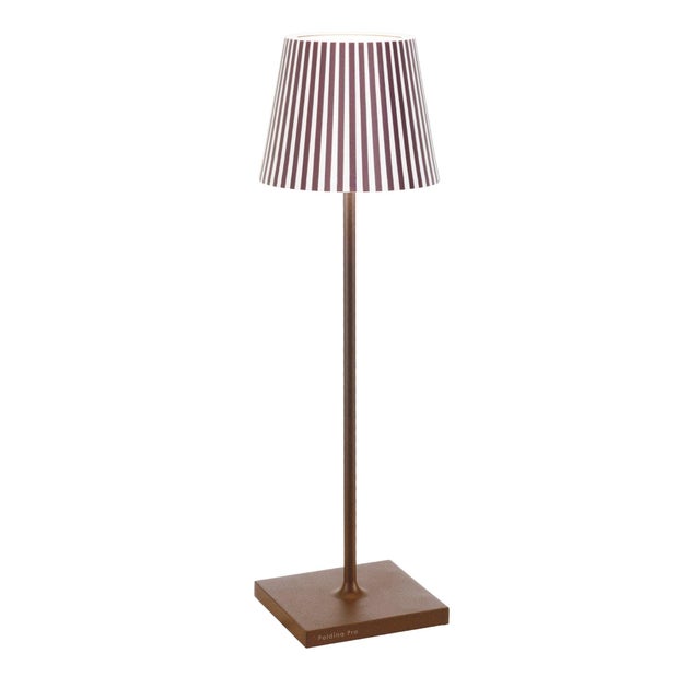 Elevate your Poldina lamp with our new collection of twelve vibrant graphic shades, curated by Federico de Majo. These...