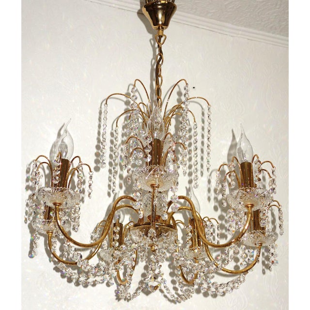 Antique Brass and Lead Crystal 7-Light Chandelier from Preico, 1980s, in Very Good conditions. Designed 1980 to 1989 This...