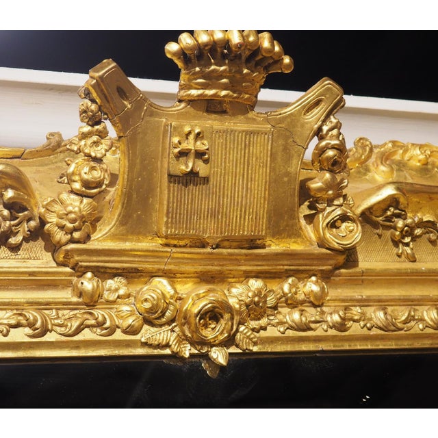 More information coming soon… A very impressive Louis XV-style giltwood French mirror, hand-carved circa 1890 during La...