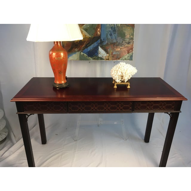 Functionality and beauty in one! This lovely Chippendale style console is practical and stylish! Fretwork, drawer, carved...