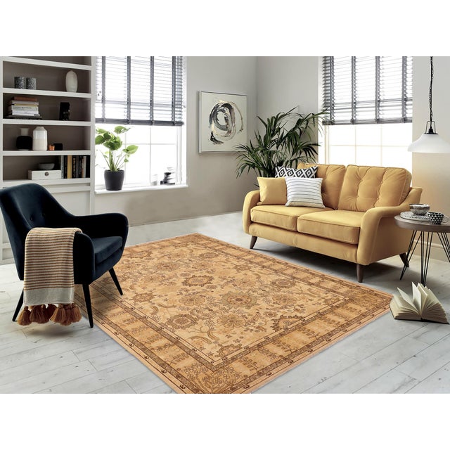 "Enhance the ambiance of your home with this magnificent Persian-influenced Turkish hand-knotted rug made by skilled...