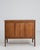 This exquisite chest of drawers captures the graceful spirit of the Louis XV period, rendered in rich wood with the...