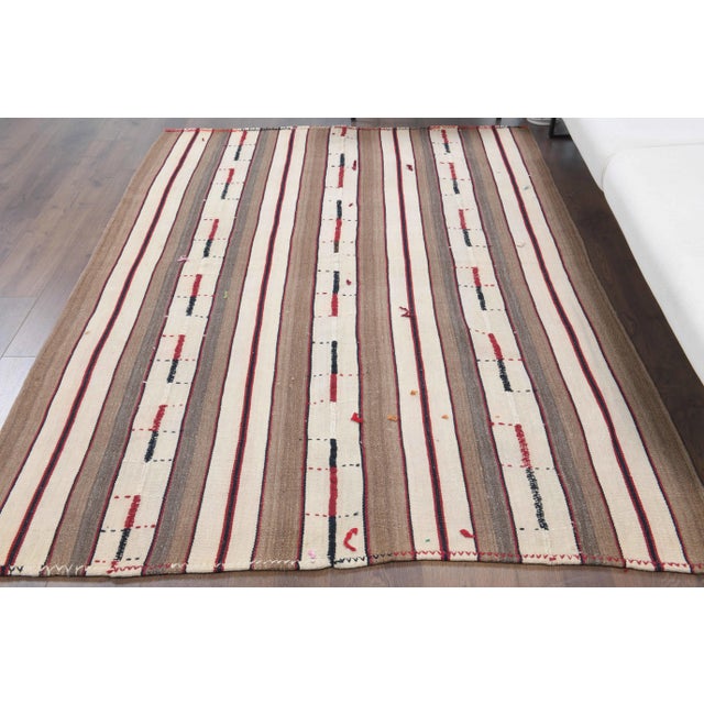 Vintage Turkish Hand-Knotted vintage rug is a semi-antique vintage kilim area rug.'70s Eastern region of Turkey's unique...