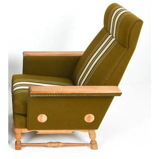 A hip and stylish retro modern, circa 1960's/70's Danish high back mid-century lounge chair. The chair is constructed on a...