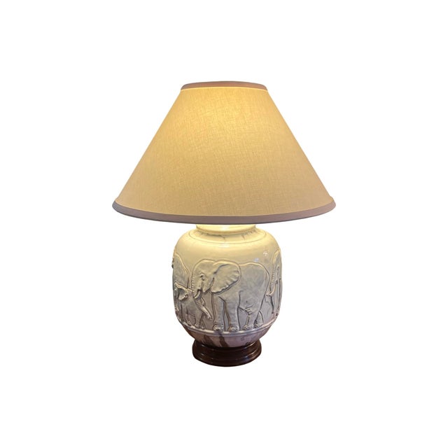 We have for your consideration a very giant mid century modern table lamp. Table lamp consists of a ceramic elephant...