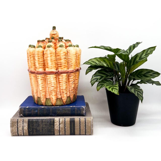 Stunning, Italian ceramic jar in the shape of a cluster of carrots. Maker’s mark “Nove San Marco Made in Italy” is stamped...