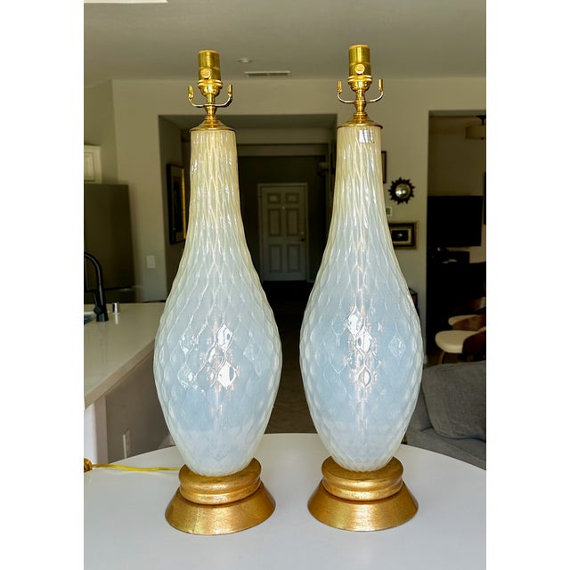 Pair of Large Murano Venetian hand blown opalescent blue glass table lamps. The glass surface has diamond-molded pattern...