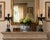 A characterful pair of late-20th-century figurative candleholders cast in iron and retaining their original painted...