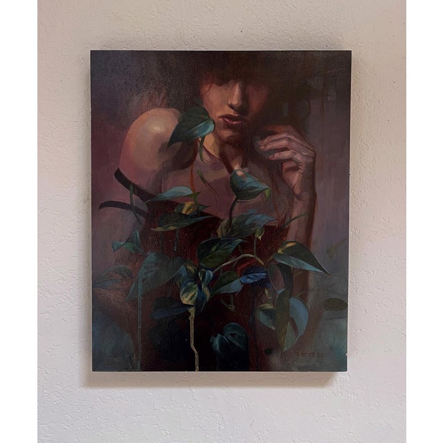 The artwork depicts a figure partially obscured by shadows, with a delicate interplay of light highlighting their features...
