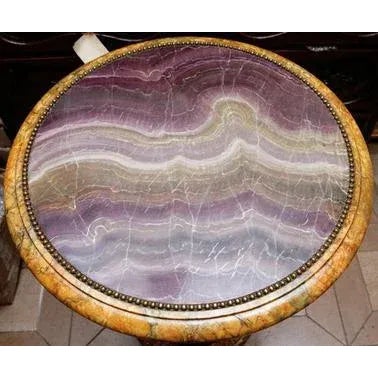 Pair of Turn of the Century Italian Carved Giltwood Occasional Tables. The top of the tables are Faux Painted Marble.