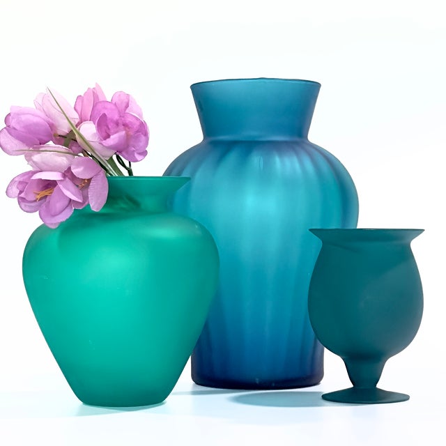 Bring the calming, organic beauty of the sea into your interior space with this exquisite unique grouping of frosted glass...
