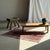 Antique Indonesian teak four-legged stool. Total height: 50 cm; Width: 32 cm; Depth: 52 cm; Seat height: 50 cm. Curved...