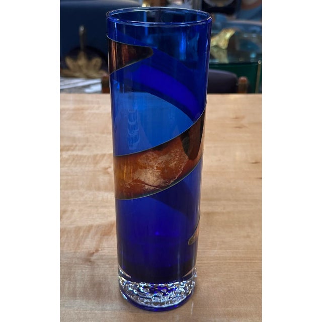 A Vintage Italian Decorative Blue Vase from the 1980s exudes the charm of that era's design. With a captivating blue hue,...