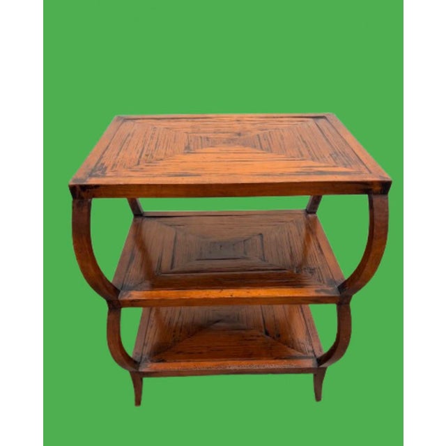 A fantastic Henredon Acquisition tree tier side table, handcrafted from mahogany solids and crushed bamboo slat veneer in...