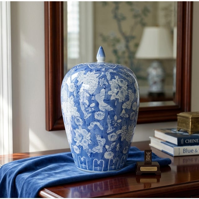A striking 1960s Chinese porcelain ginger jar featuring a high-shouldered melon silhouette and its matching domed lid with...