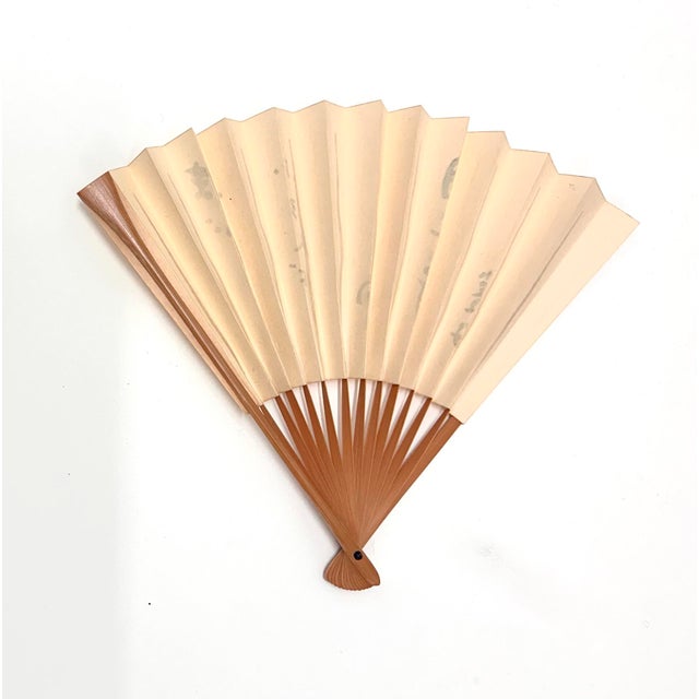 Mid-century Japanese folding fan featuring expressive ink calligraphy in a minimalist composition. Purchased in Japan...
