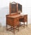 A fine early 20th-century satinwood dressing table, distinguished by its warm tone and beautifully figured veneers...