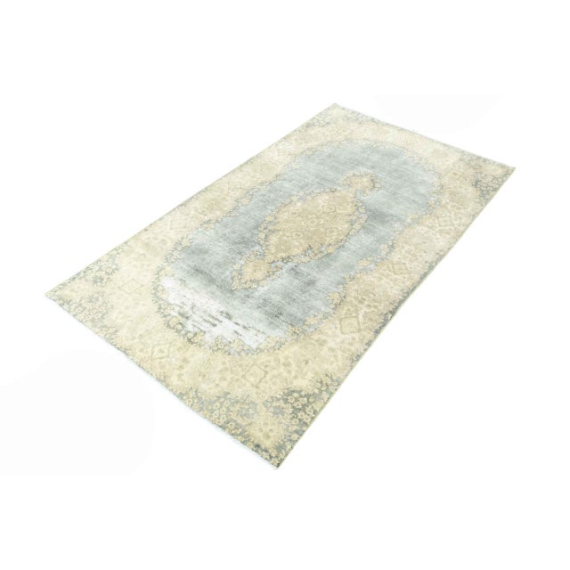 Immerse yourself in the world of elegance with our hand-knotted vintage royal carpet. Measuring 246 x 138 cm, this rug is...