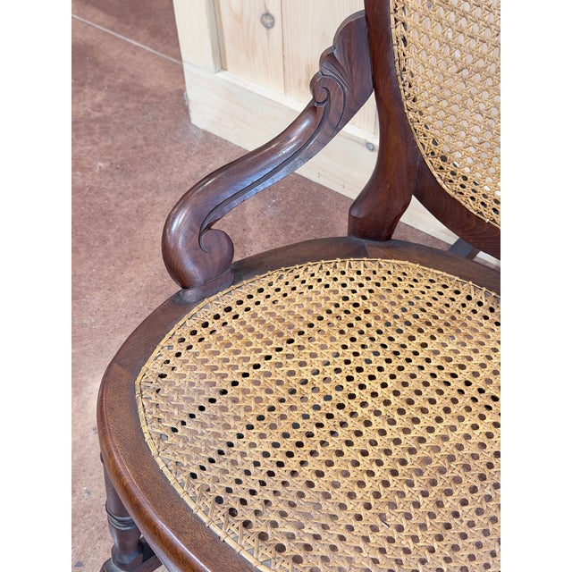 Late 20th Century Vintage Victorian Mahogany Cane Back Rocking Chair With Carved Crest For Sale - Image 5 of 7