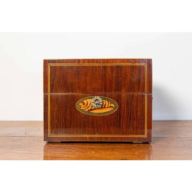 A Danish mahogany box from circa 1840 with ash marquetry and banding. This exquisite Danish mahogany box from circa 1840...