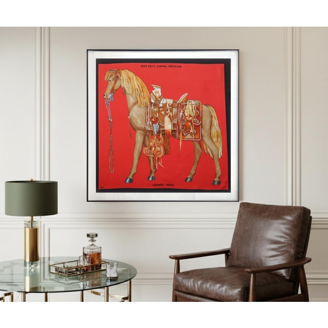 This is a gorgeous and authentic Hermès Scarf "Mon Petit Cheval Mexicain" in an elegant midnight black aluminum frame....