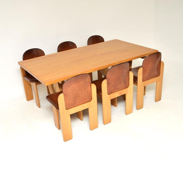 A rare and incredibly well made vintage Italian dining table and chairs by Silvio Coppola. They were made in Italy by...
