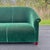 A scarce vintage loveseat by John Hutton for Donghia with rolled arms and back in original emerald green mohair and...