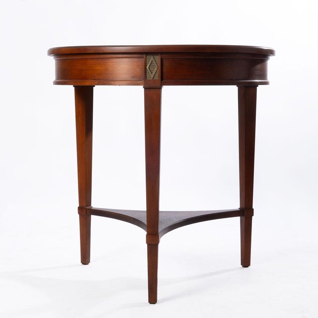 Round Stickley table with brass inlay. Beautiful design on the top and in the brass inlay. Great for a side table or entry...