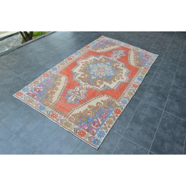 This is a vintage Turkish handknotted Anatolian OUSHAK rug. We collect Vintage rugs from Anatolia, which is the eastern part