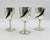 A striking set of three silver-plated wine goblets designed and manufactured in Taxco, Mexico by renowned artist and...