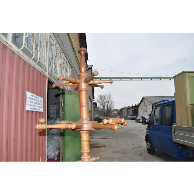 Turned standing hanger: c. 1900. Beech. In good condition.