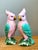 This delightful pair of vintage porcelain parrot figurines brings color, charm, and refined craftsmanship to any interior....