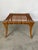 T.H. Robsjohn-Gibbings Klismos stool with original woven leather strap seats, 1960s, produced by Saridis of Athens. This...