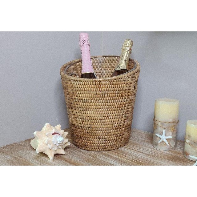 Our artisan-crafted Rattan Champagne Bucket will add texture and elegance to your celebrations. This stunning piece...