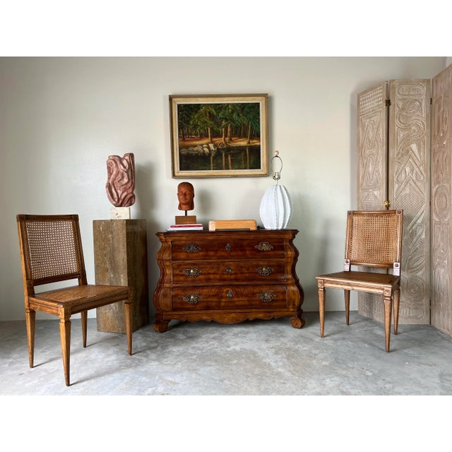 A wonderful Antique Italian Neoclassical Louis XVI - style wood and cane accent chairs a pair. It features beautiful...