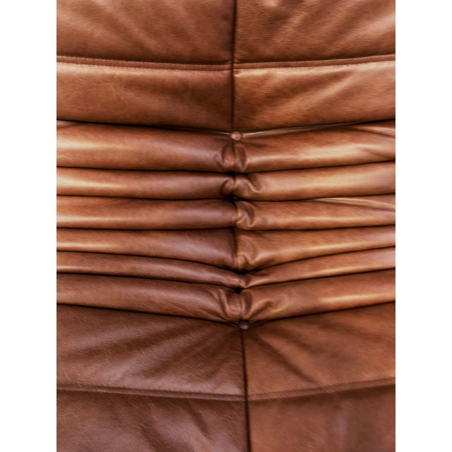 French Togo Lounge Chair in Dark Cognac Leather by Michel Ducaroy for Ligne Roset, in Restored conditions. Designed 1970...