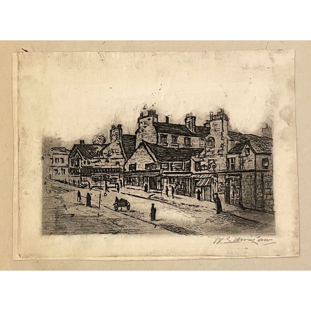 1920s etching by W.S. Edinlaw of a Belgian street. In original paper mat with an inscription in the artist's hand "Street...