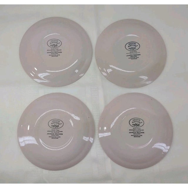 Lovely set of four bread plates in the charming Blue Petite Fleur pattern from Laura Ashley, produced by Johnson Brothers....