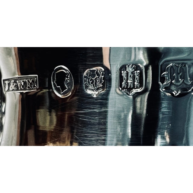 This handsome coffee pot was made by James & William Marshall in Edinburgh, Scotland in 1843. The repoussé work is...