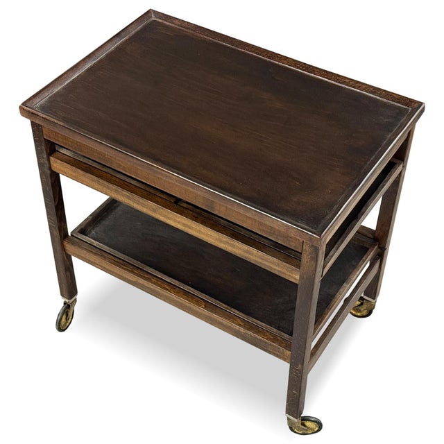 A serving trolley by Thonet, representing an elegant and highly practical piece from the interwar modernist period. Its...