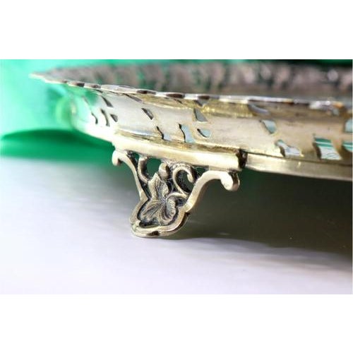 Silver Tray with Leaf-Shaped Rack and Guilloche Engravings, in Very Good conditions. Designed 1890 to 1919 This piece has...