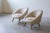 Lounge chairs in very nice shape and quality. Reupholstered with plush sheep skin in light beige and tapered legs in teak....