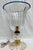 Hand-blown and hand-crafted Murano glass table lamp. Blown glass base with gold leaf, clear central sphere, and blue-edged...