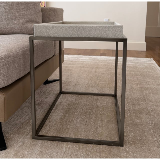 Elegant Restoration Hardware side table featuring a faux shagreen tray top set on a minimalist dark metal frame. Clean,...