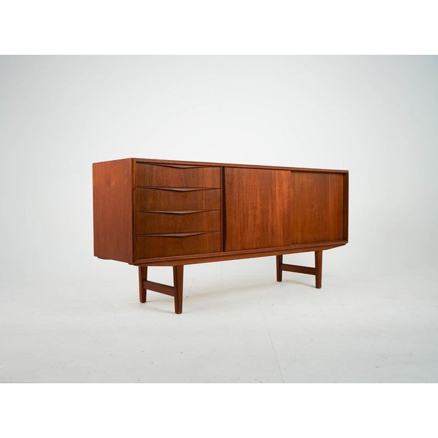 Vintage Mid-Century Teak Sideboard by Erling W. Bach, 1960s, in Very Good conditions. Designed 1960 to 1969 I have...