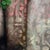 The Gold in the Cave of Gadara by Ifeoluwa Alade | Acrylic and glow in the dark medium on canvas depicting butterflies and rocks. For Sale - Image 4 of 5