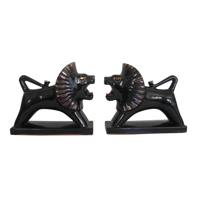 Art Deco Black and Gold Lion Bookends or Decorative Objects a Pair